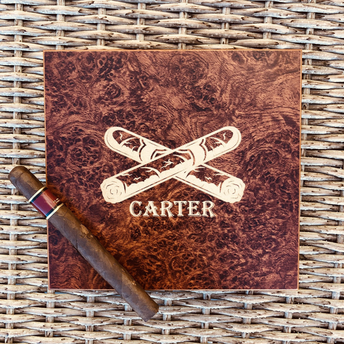 Personalized burl wood cigar humidor with Spanish cedar interior, the ideal long-term storage solution for a growing cigar collection