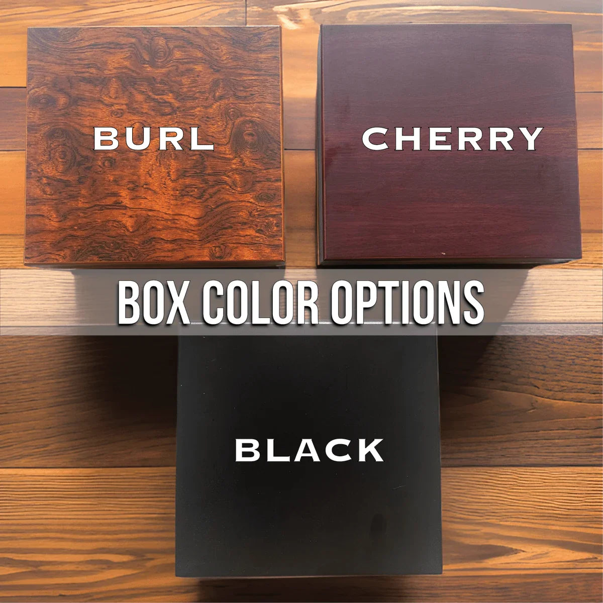 Three wooden cigar humidor boxes displaying finish options: burlwood with swirled grain pattern, dark cherry wood, and black lacquer, labeled as available color choices